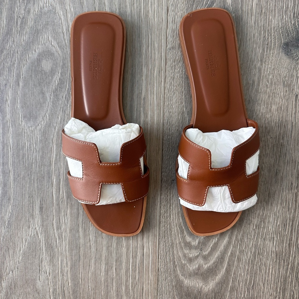 HERMES Oran Sandals in "GOLD"